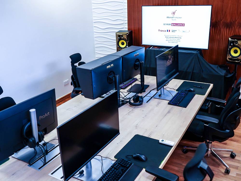 A studio of workstations prepared for a session
